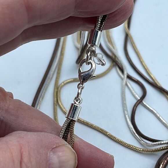 Triple strand mixed metals chains rings pendant necklace - Picture 5 of 10